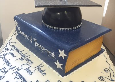 Graduation Cap and Book