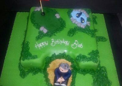 Golfing Green With Character Cake