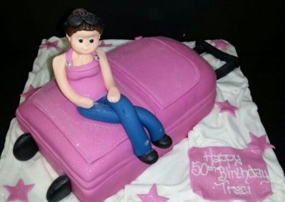 Woman on Suitcase Cake